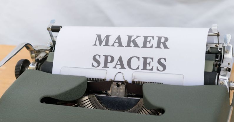 Interactive Workshops - A typewriter with a paper that says maker spaces